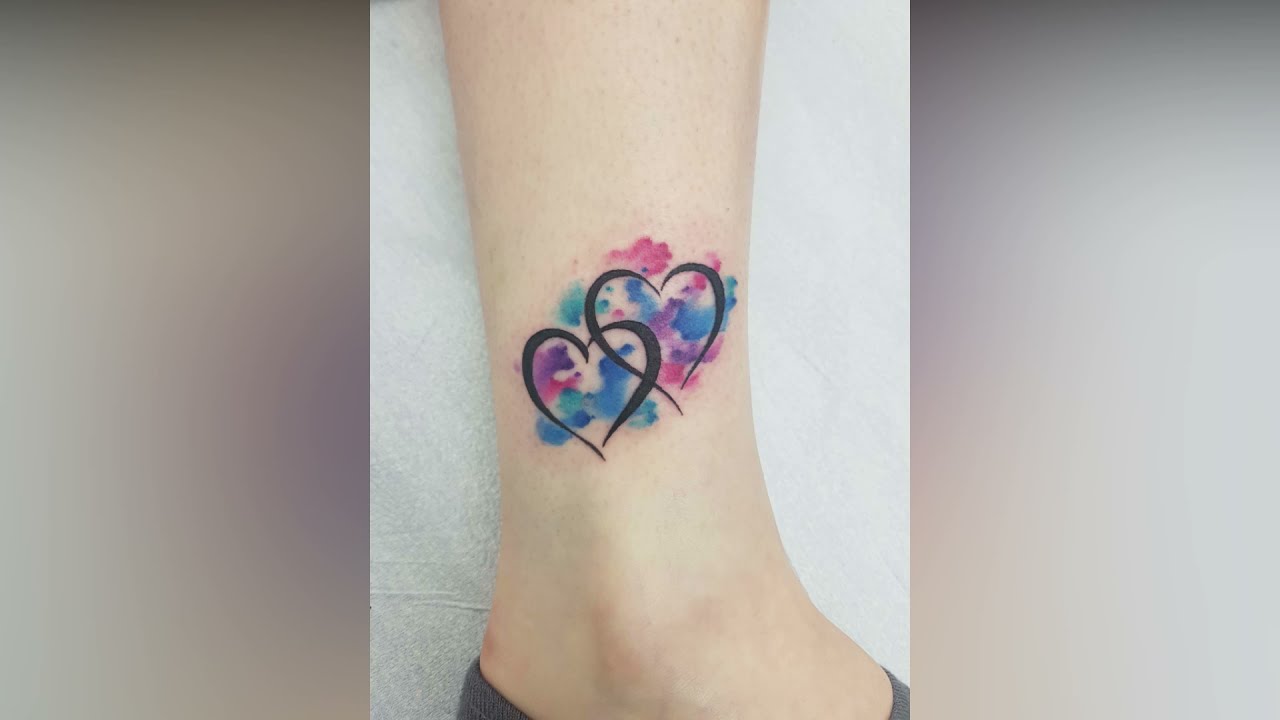 tatuajes de corazones en el brazo para mujeres